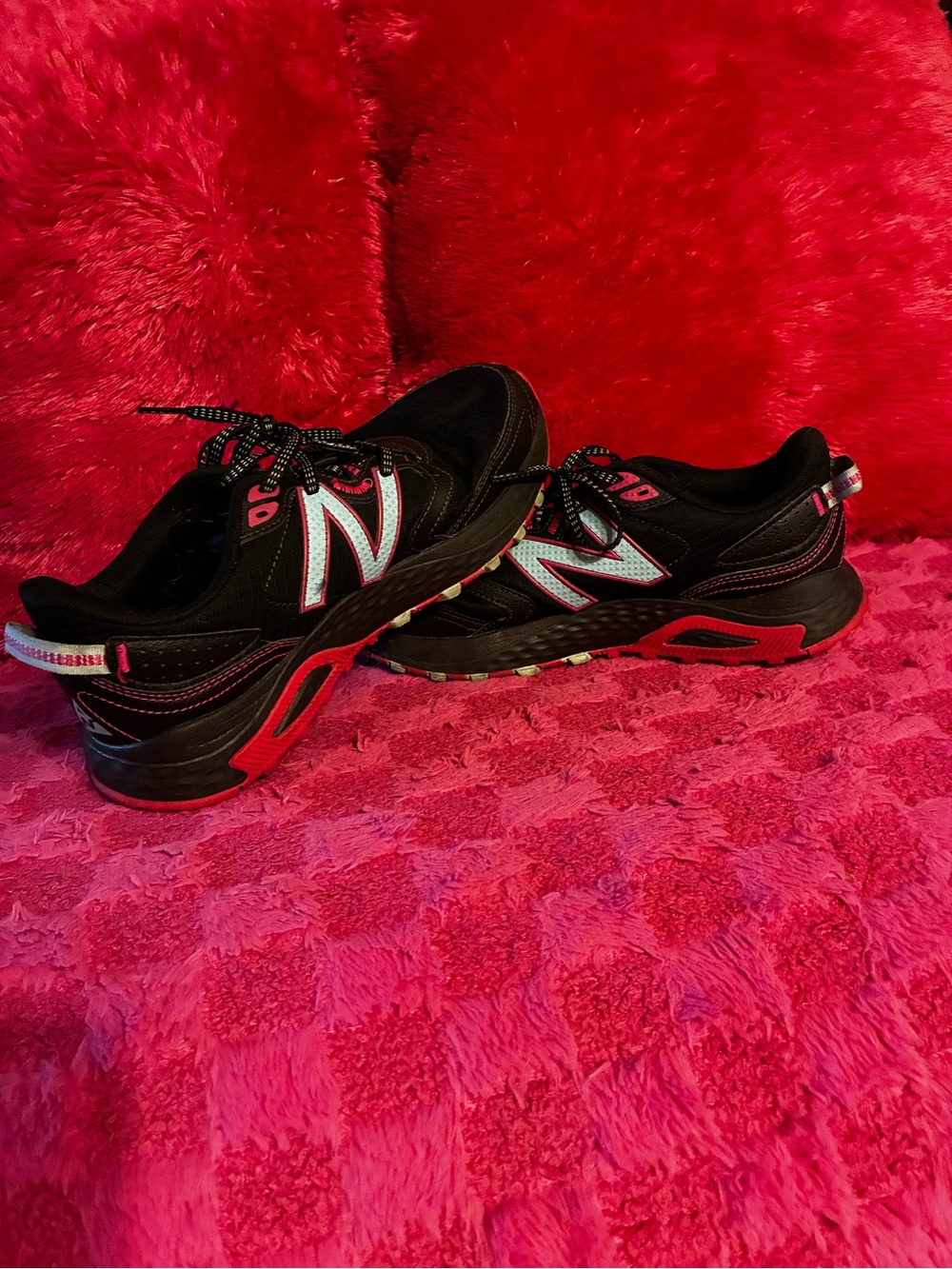 New Balance Women's Black Athletic Sneakers with Pink Accents